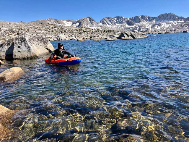Graduate student, Caroline Owens, collecting bathymetry data the Sierra Nevada. Credit: Michelle Lee